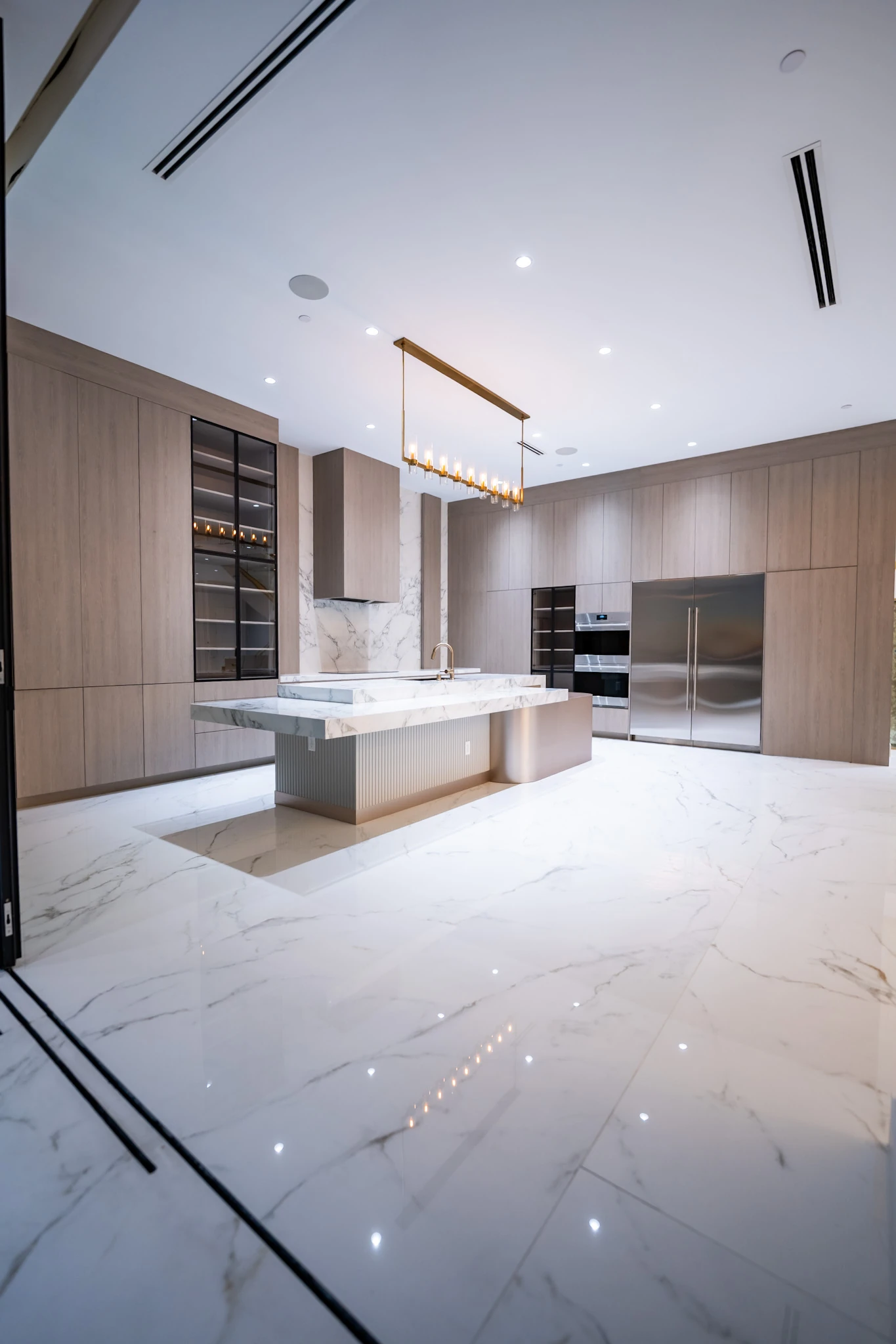 Joelene kitchen with waterfall island, actual finished home