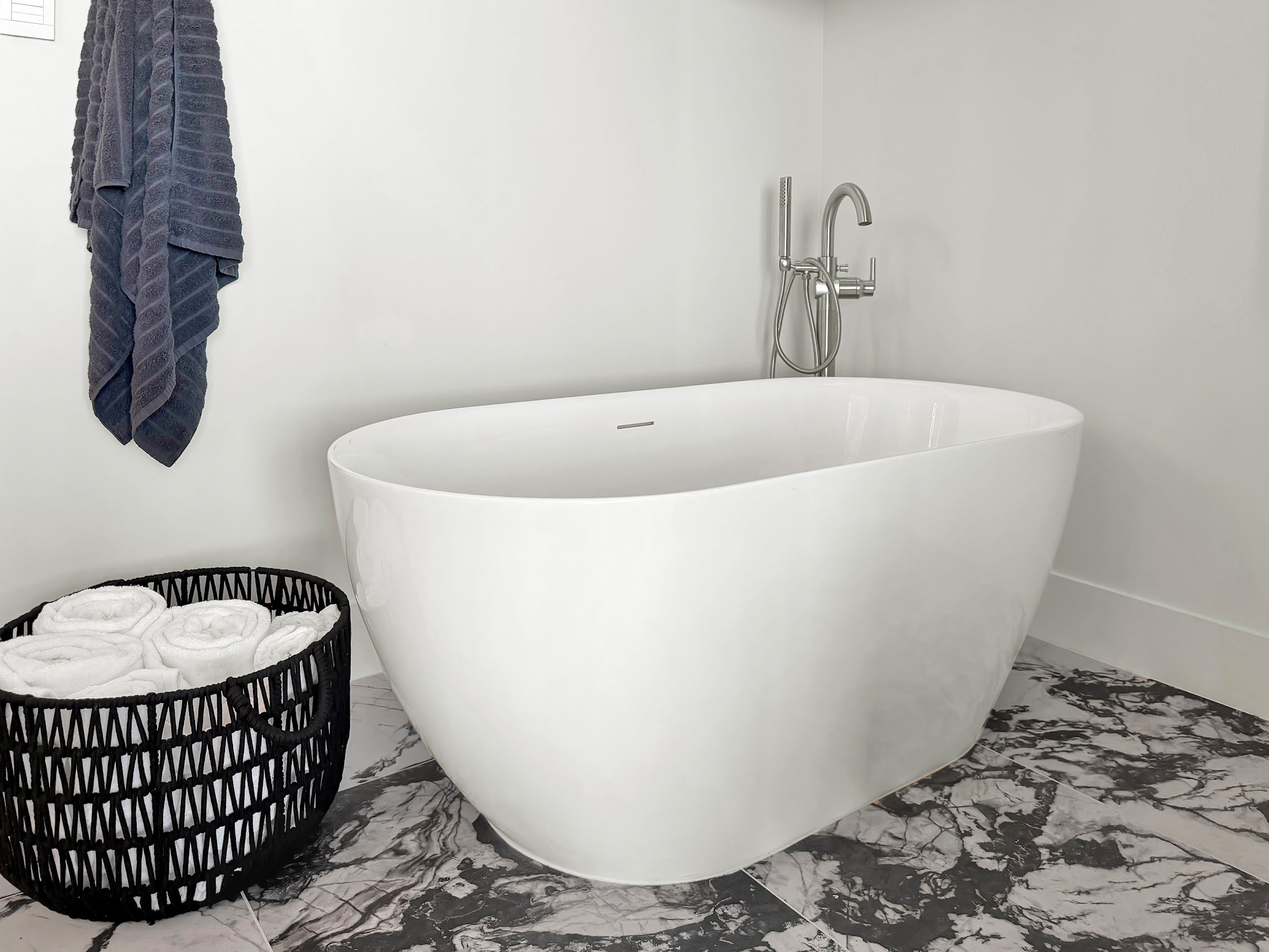 Primary bath with freestanding tub, Velour home in Modern Flare